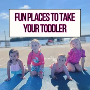 4 toddlers in their bathing suits are a splash pad for fun places to take your toddler main header image.