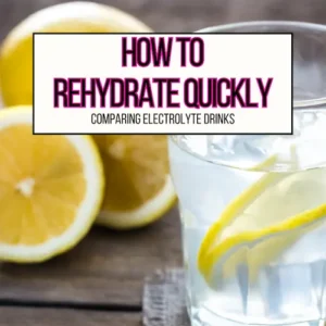 A glass of water with lemon slices in it for how to rehydrate quickly main header image.
