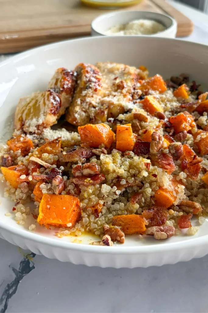The quinoa and butternut squash bowl on a table.