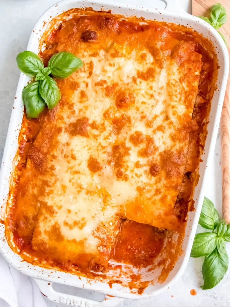 A ground turkey and zucchini lasagna made with cottage cheese in a baking dish, right out of the oven. 