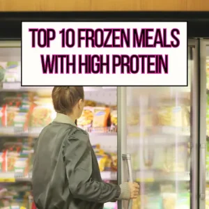 A woman reaching into the freezer at the grocery store, choosing a frozen meal with high protein.