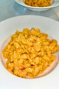 A big bowl of cottage cheese and sweet potato pasta on a counter.