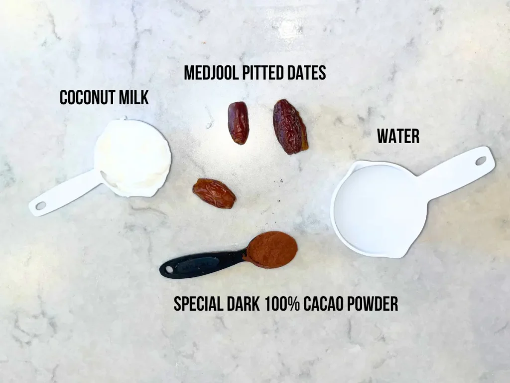 The ingredients for the healthy date chocolate sauce on a counter.