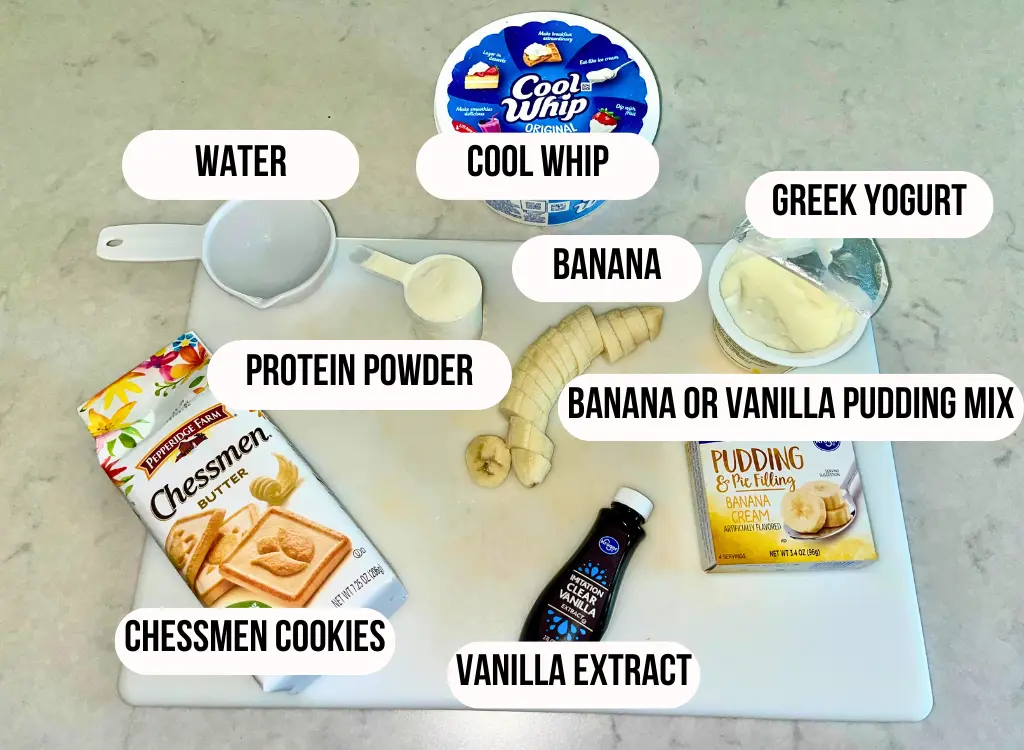 Individual ingredients for the high protein banana pudding on a white cutting board on the counter.