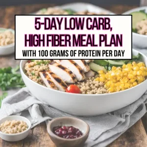 A grilled chicken quinoa bowl with lots of vegetables on a dining room table for low carb, high fiber meal plan main header image.