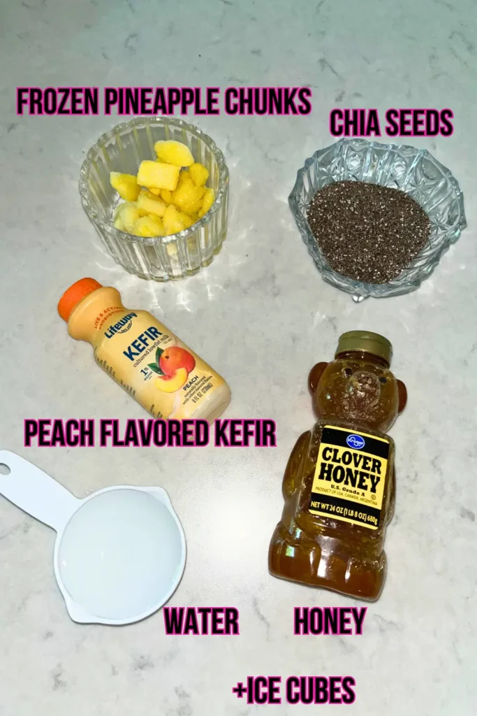 Ingredients for a pineapple peach smoothie on a counter.