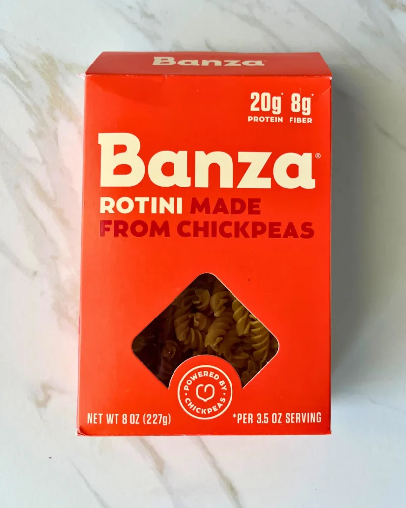 A box of Banza chickpea pasta on a counter.