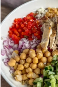 A chickpea chicken bowl close-up on a table.