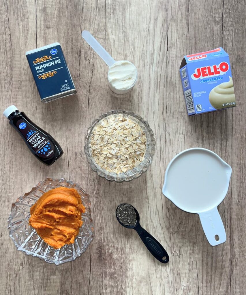 Individually portioned ingredients for the pumpkin cheesecake overnight oats on a counter.