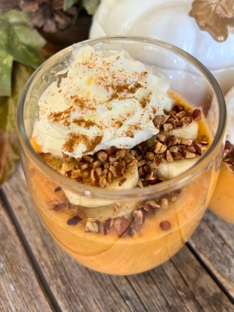 A close-up of the toppings on top of the pumpkin cheesecake pudding.