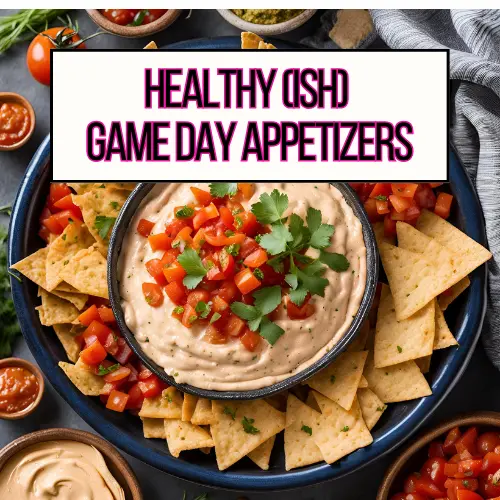 A bowl of dip on an appetizer platter surrounded by chips and fresh vegetables.