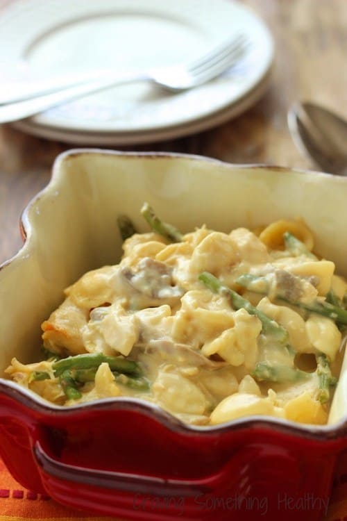 Slow cooker chicken and asparagus pasta in a casserole dish on the table.