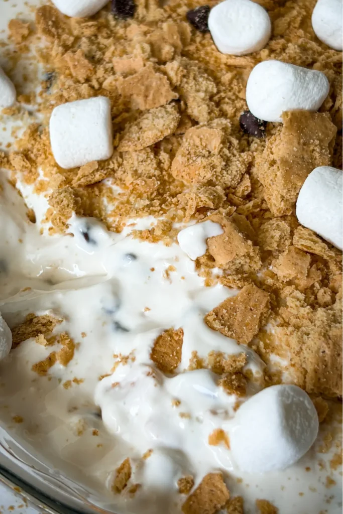 A close-up of a concaved area of the s'mores dip showing the creaminess. 