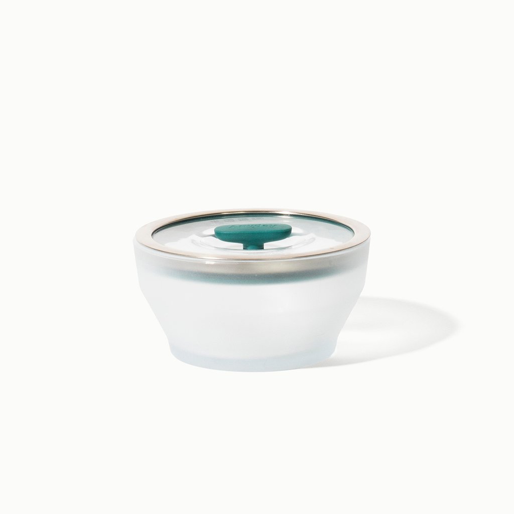 A deep Anyday cookware dish with the top on it.