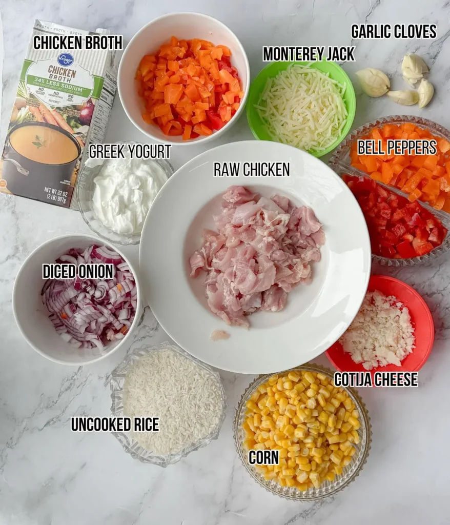 The ingredients for the casserole in bowls on a counter.