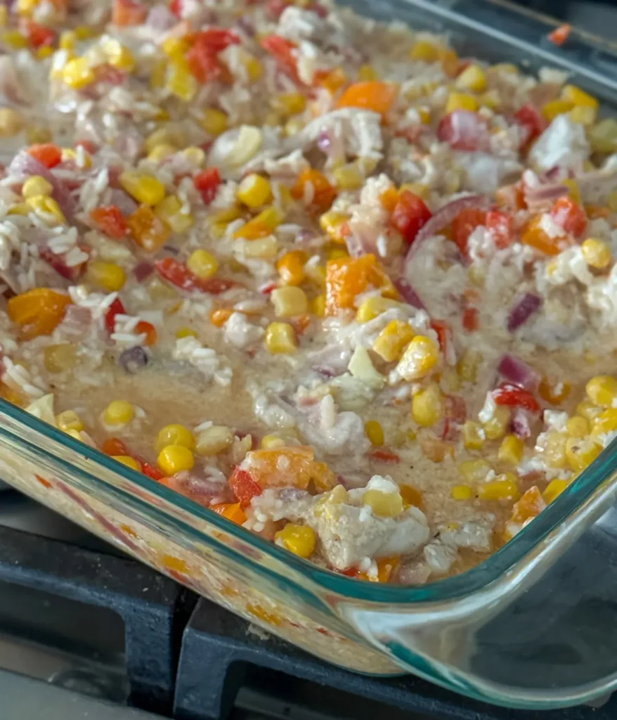 The baked street corn casserole with Greek yogurt mixed into it.
