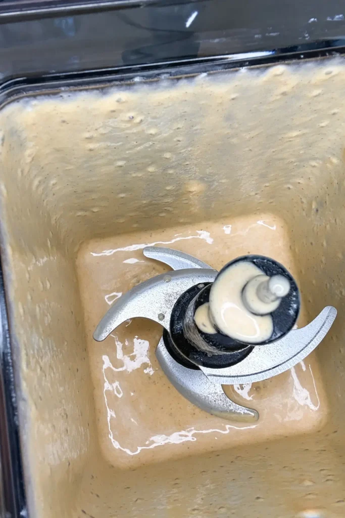 The blended ingredients in a high speed blender after mixing.