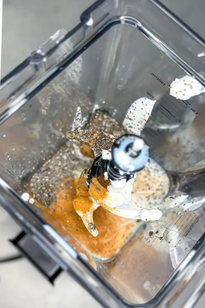 Ingredients for the sweet potato smoothie in a high speed blender.