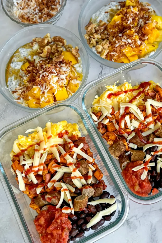 A birds-eye view showing the mango yogurt bowls and the savory sweet potato breakfast bowls on a counter.