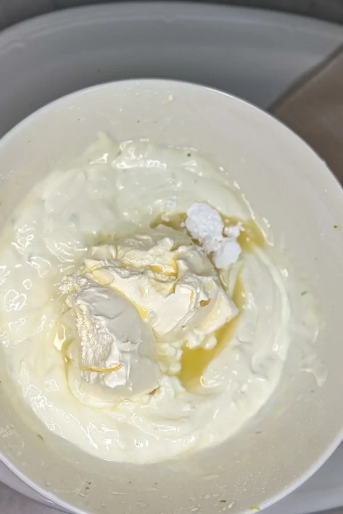 The cool whip added to a large bowl.