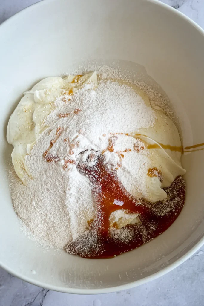 The ingredient minus the milk in a large white bowl.