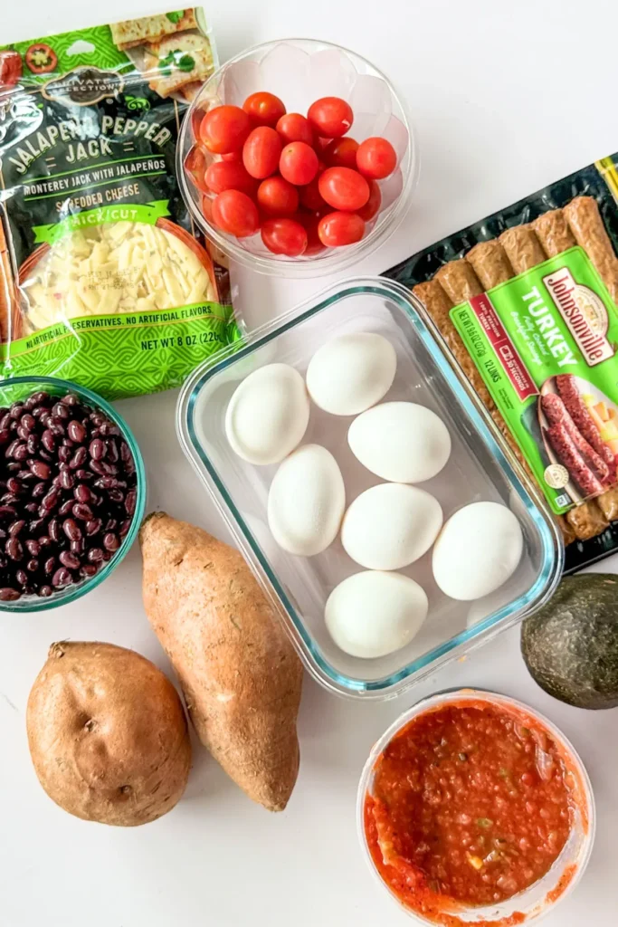 The ingredients for the sweet potato meal prep breakfast bowls on a counter.