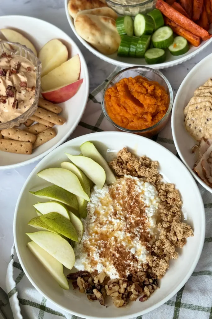 A close-up of the cottage cheese pear plate next to the other fall plates on a counter.
