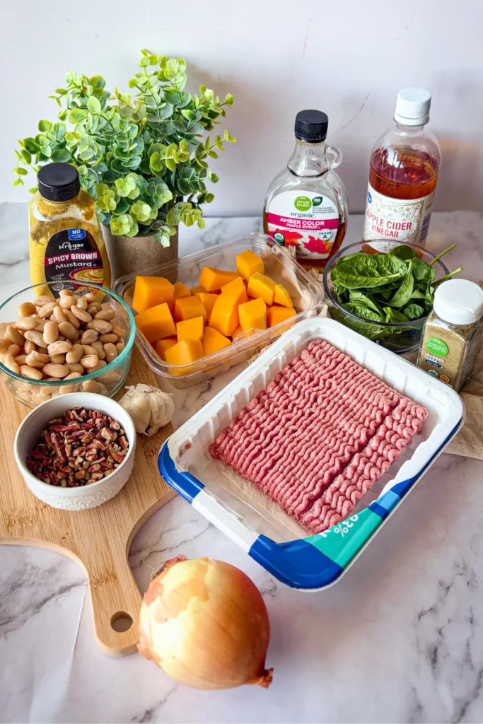 The ingredients for the butternut squash skillet on a counter.