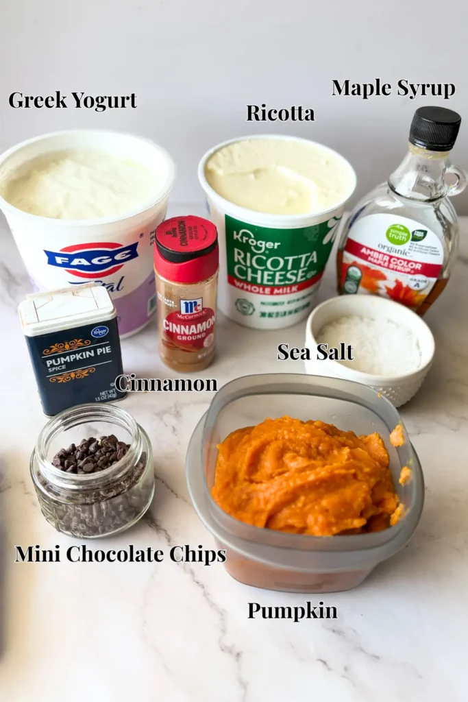 The ingredients for the pumpkin protein cannoli dip on a counter.
