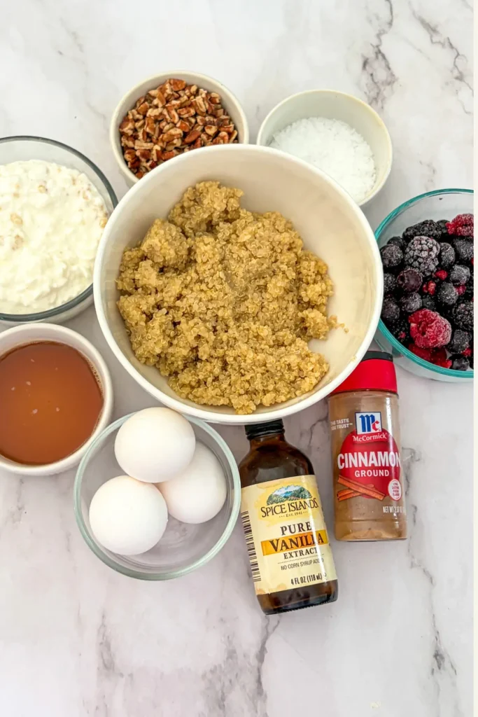 Ingredients portioned out on a counter for the maple pecan quinoa breakfast bake.